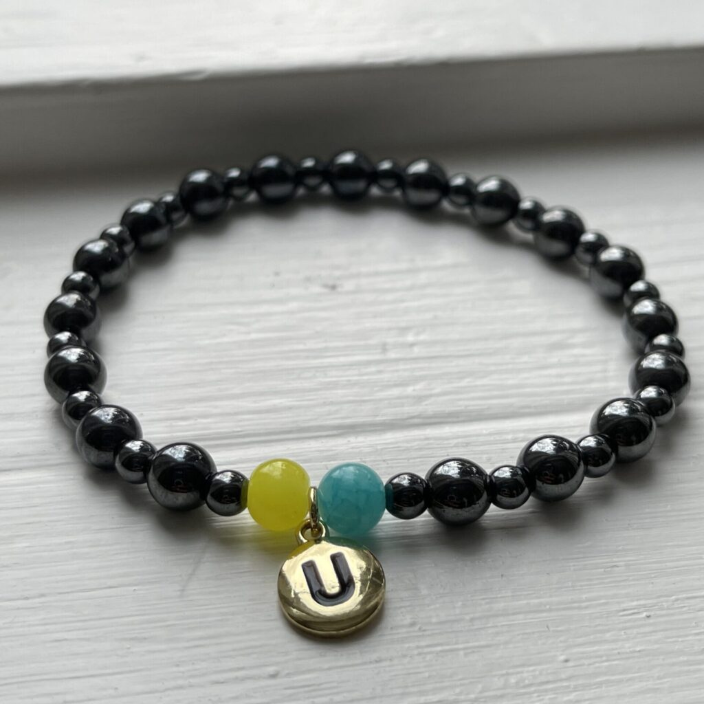 Gunmetal grey, Yellow and Blue Bracelet with Charm